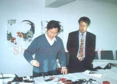 王开选·与着名画家汤立先生合影