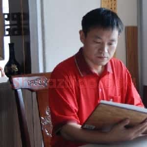 李华