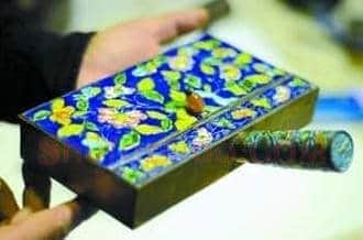 画家收藏80多把熨斗 藏品年代横跨两千年
